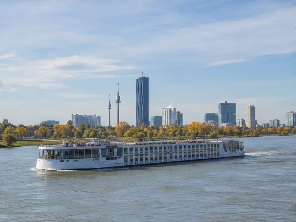 Modern river cruise ship sailing the Danube through Vienna