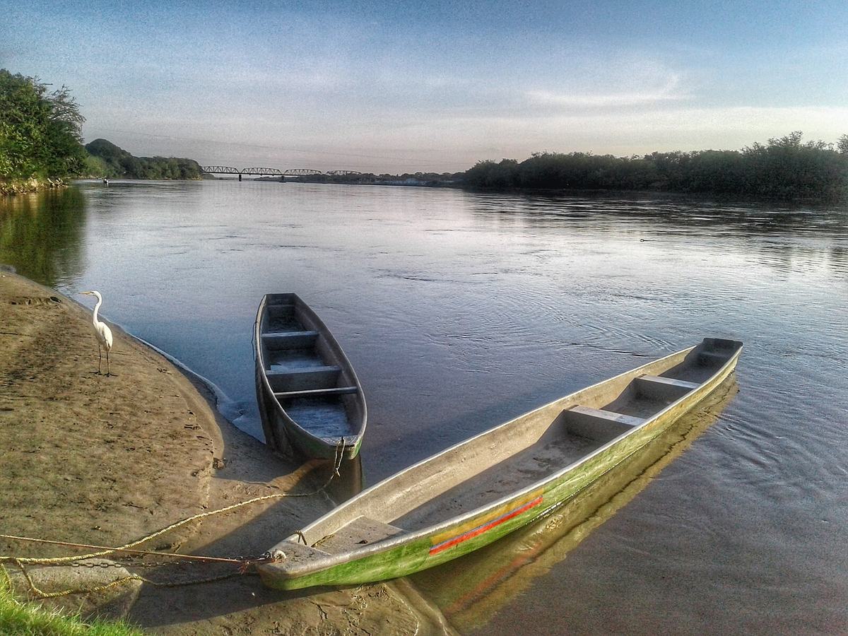Fishing canoes moored along the Magdalena River in Colombia