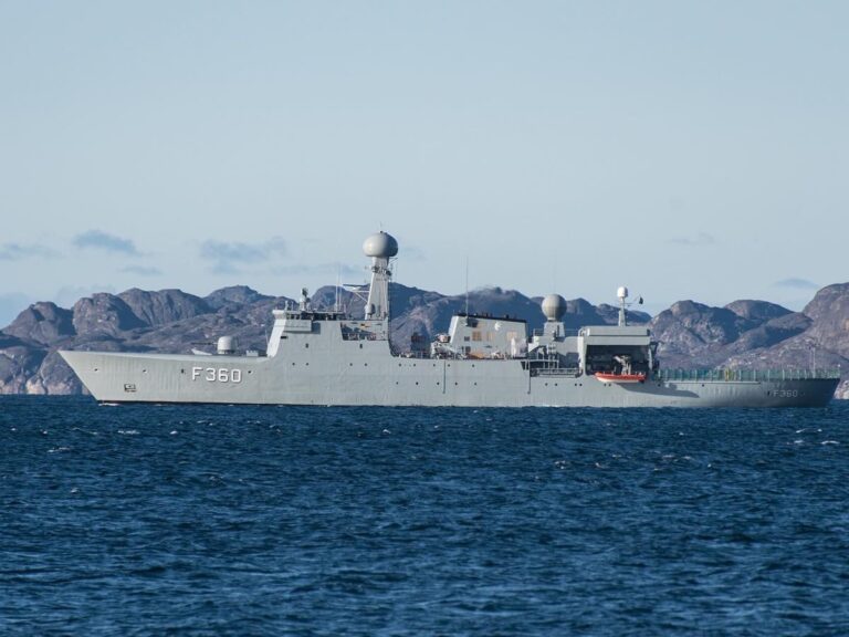 Danish patrol ship on the water with mountains outside Nuuk