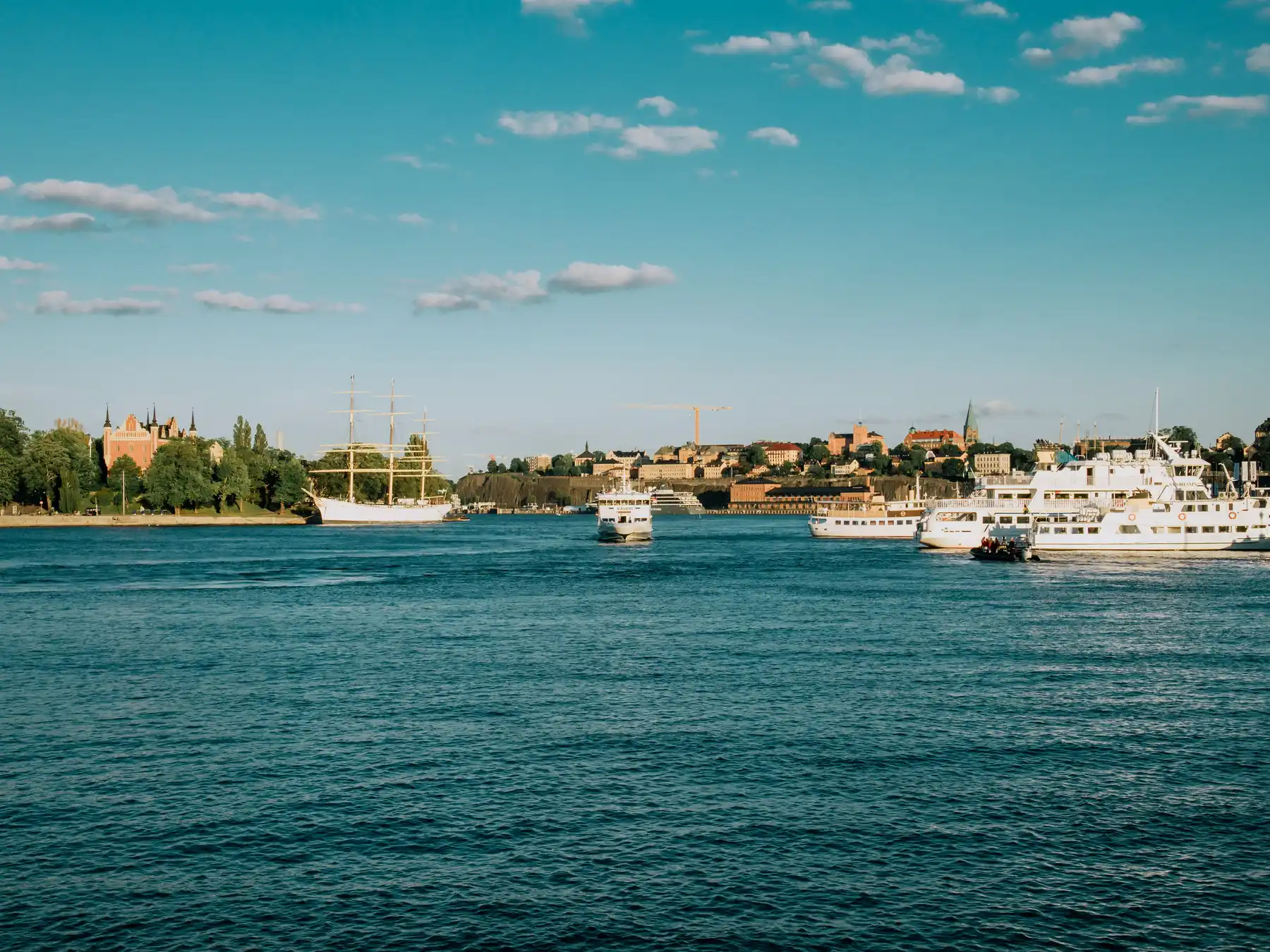 Cruise ships docked along Stockholm's waterfront.