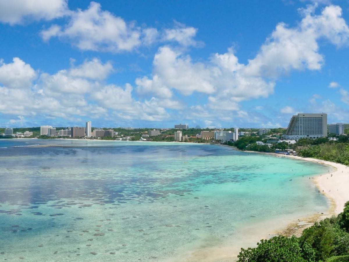Turquoise water and resort-lined beach at Tumon Bay in Guam