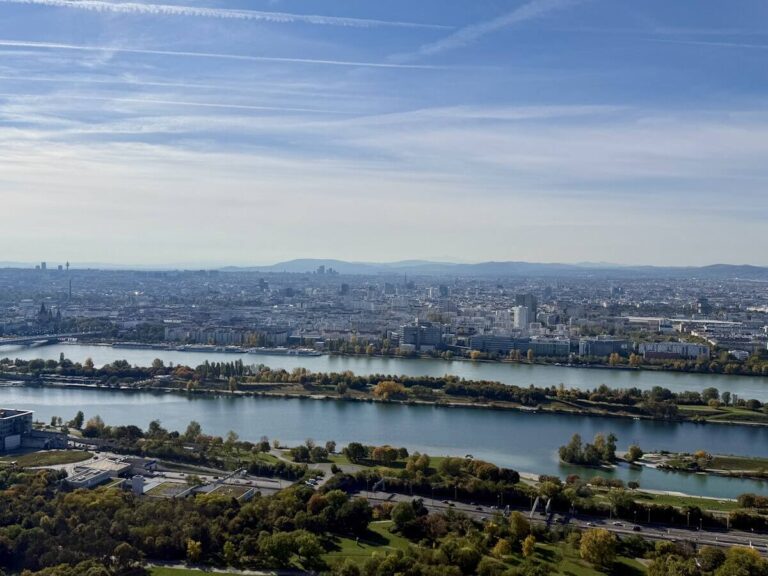 Wide view of Vienna and the Danube River from above