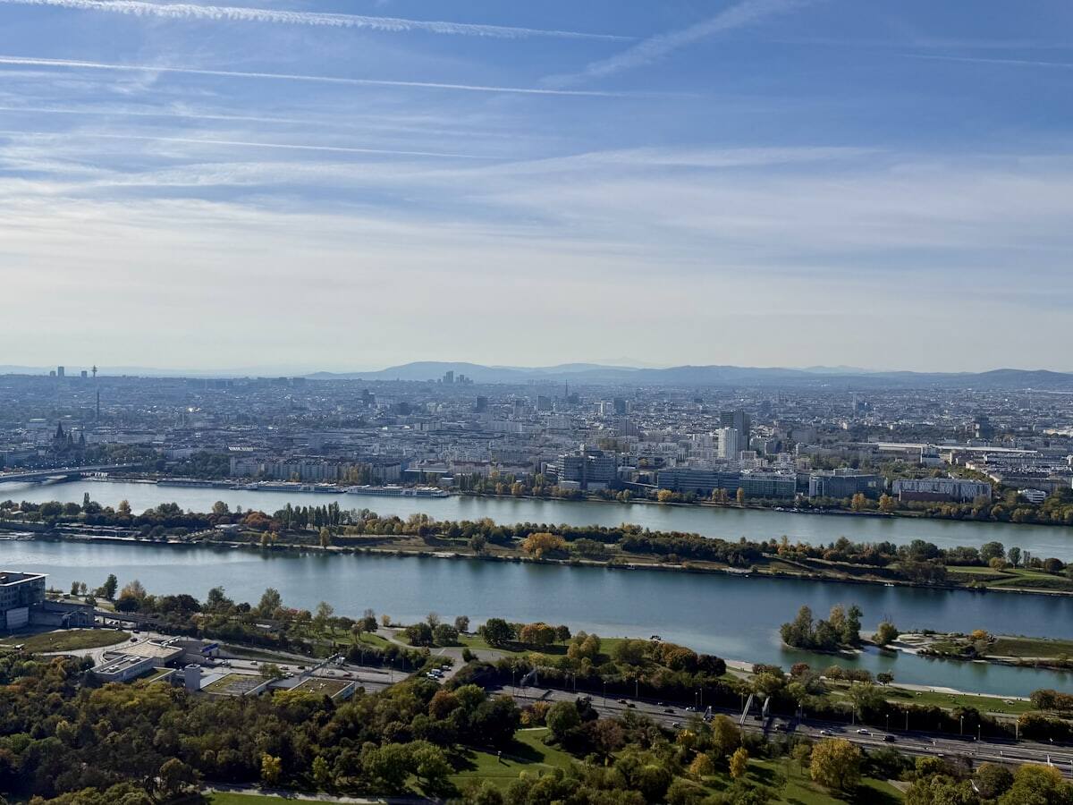 Wide view of Vienna and the Danube River from above