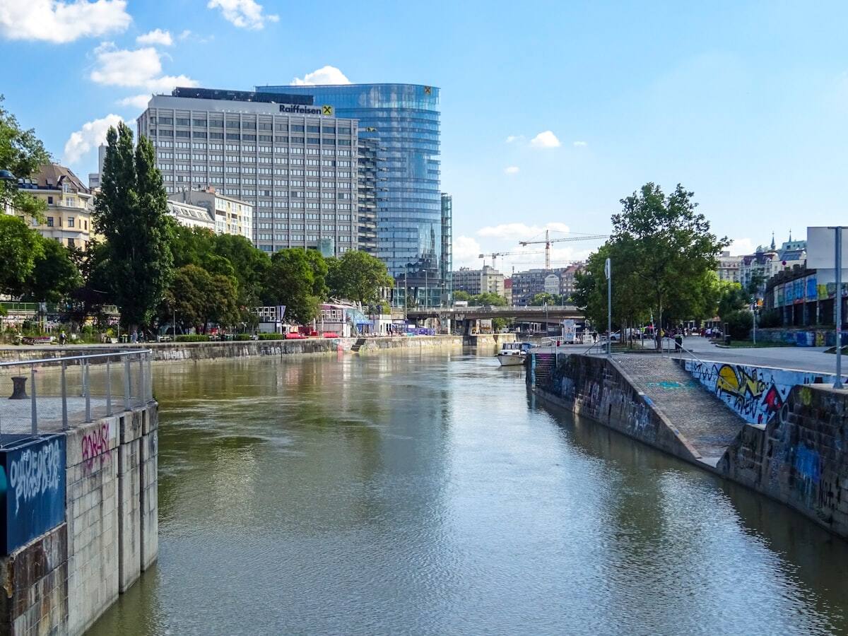 Vienna's Danube Canal waterfront with bridges and modern buildings