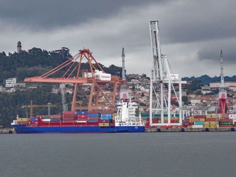 Container ship and cargo cranes at the Port of Vigo in Spain