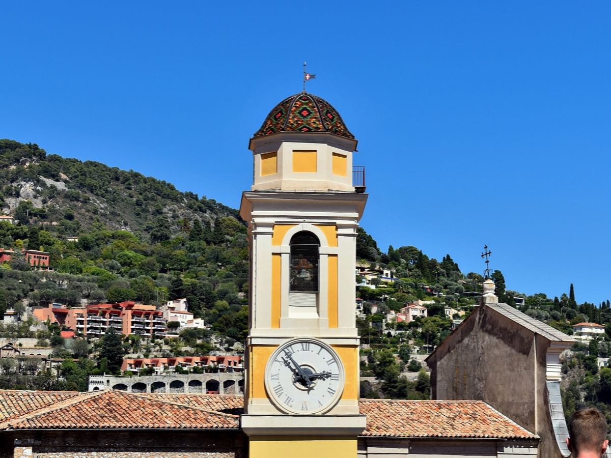 Colorful bell tower of Saint Michael Church above Villefranche-sur-Mer