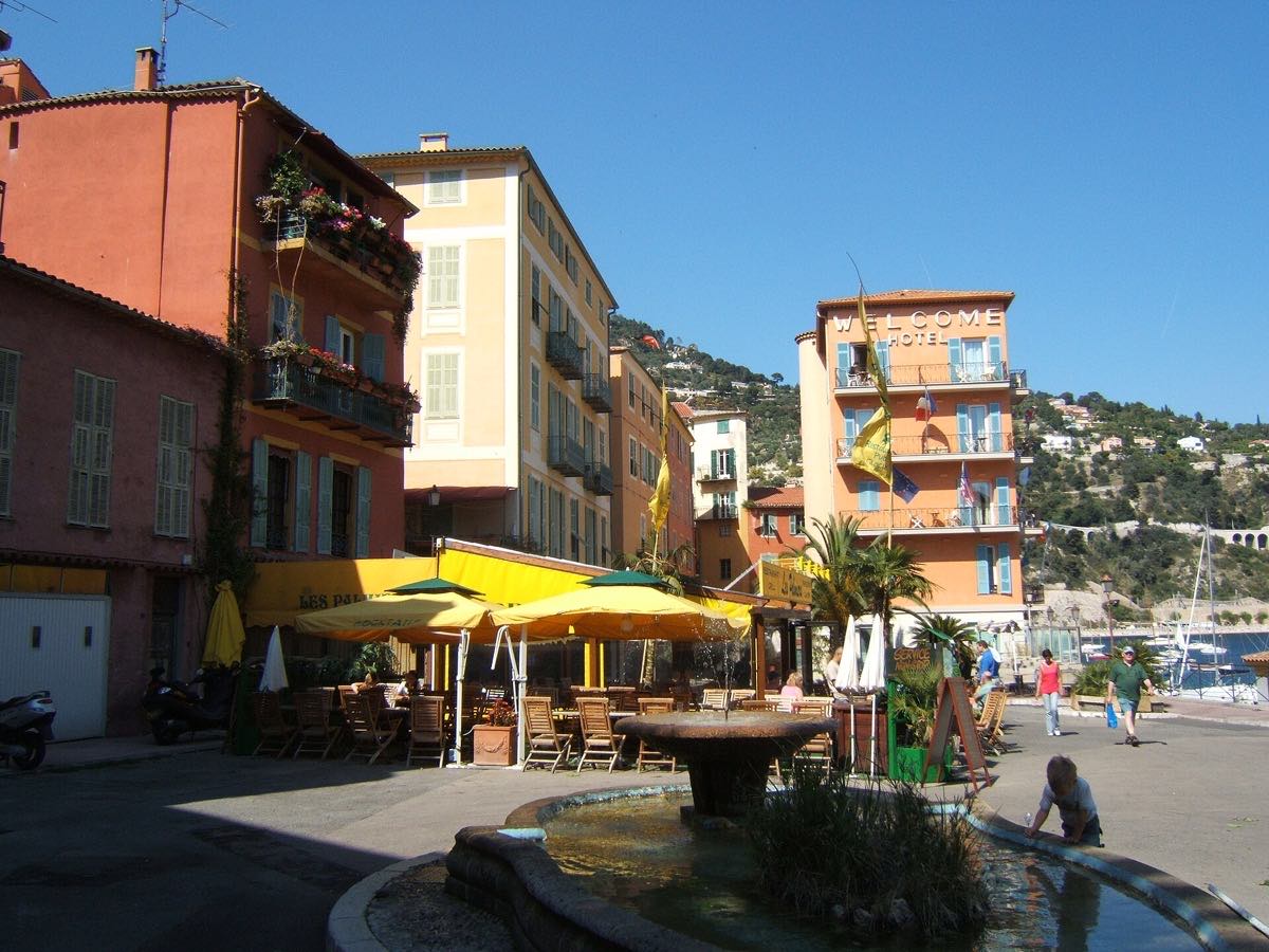 Cafes and colorful buildings beside the waterfront in Villefranche-sur-Mer
