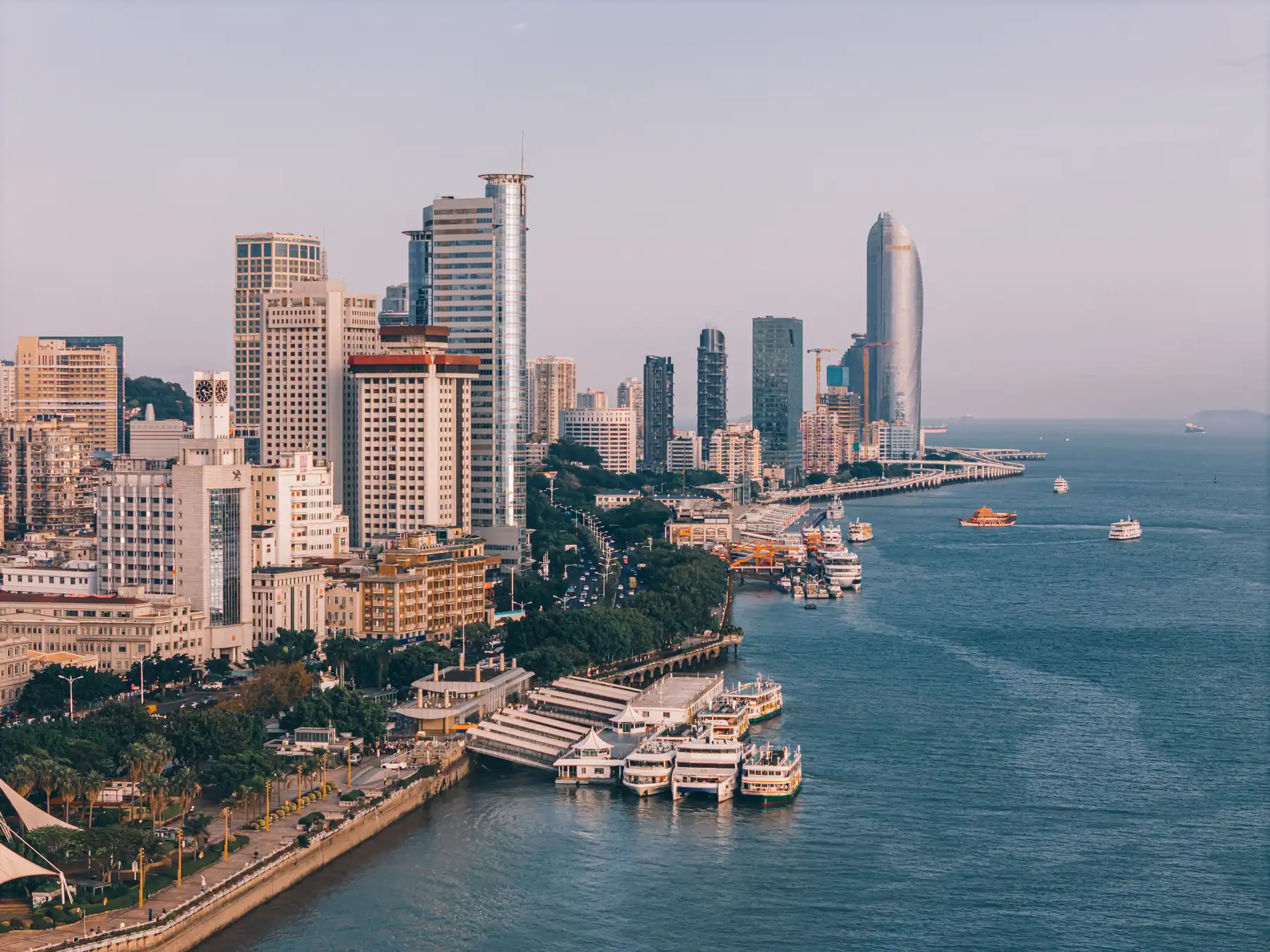 Aerial view of Xiamen skyline and boats in the harbor