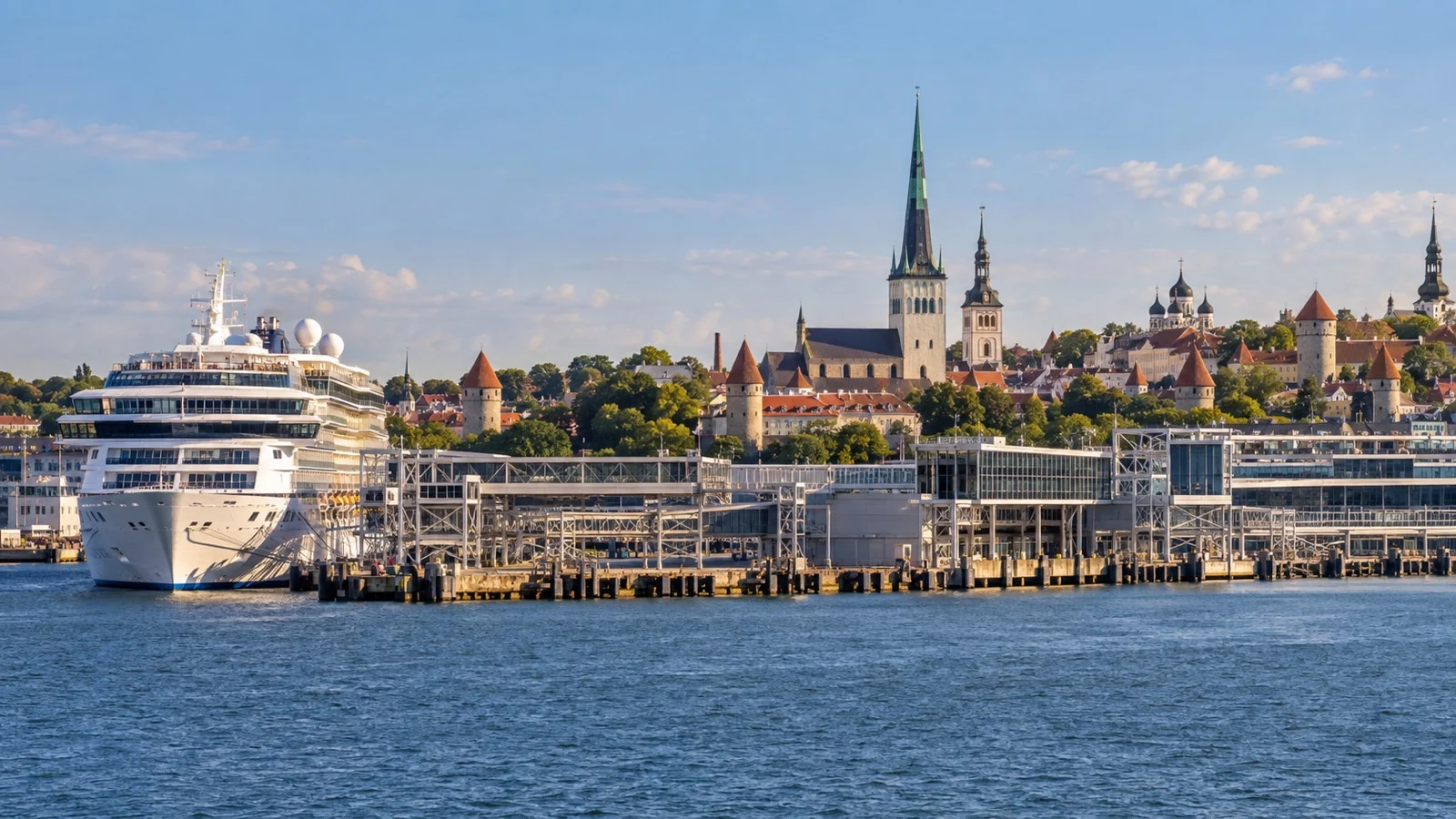 Tallinn cruise harbor with medieval towers in the distance.