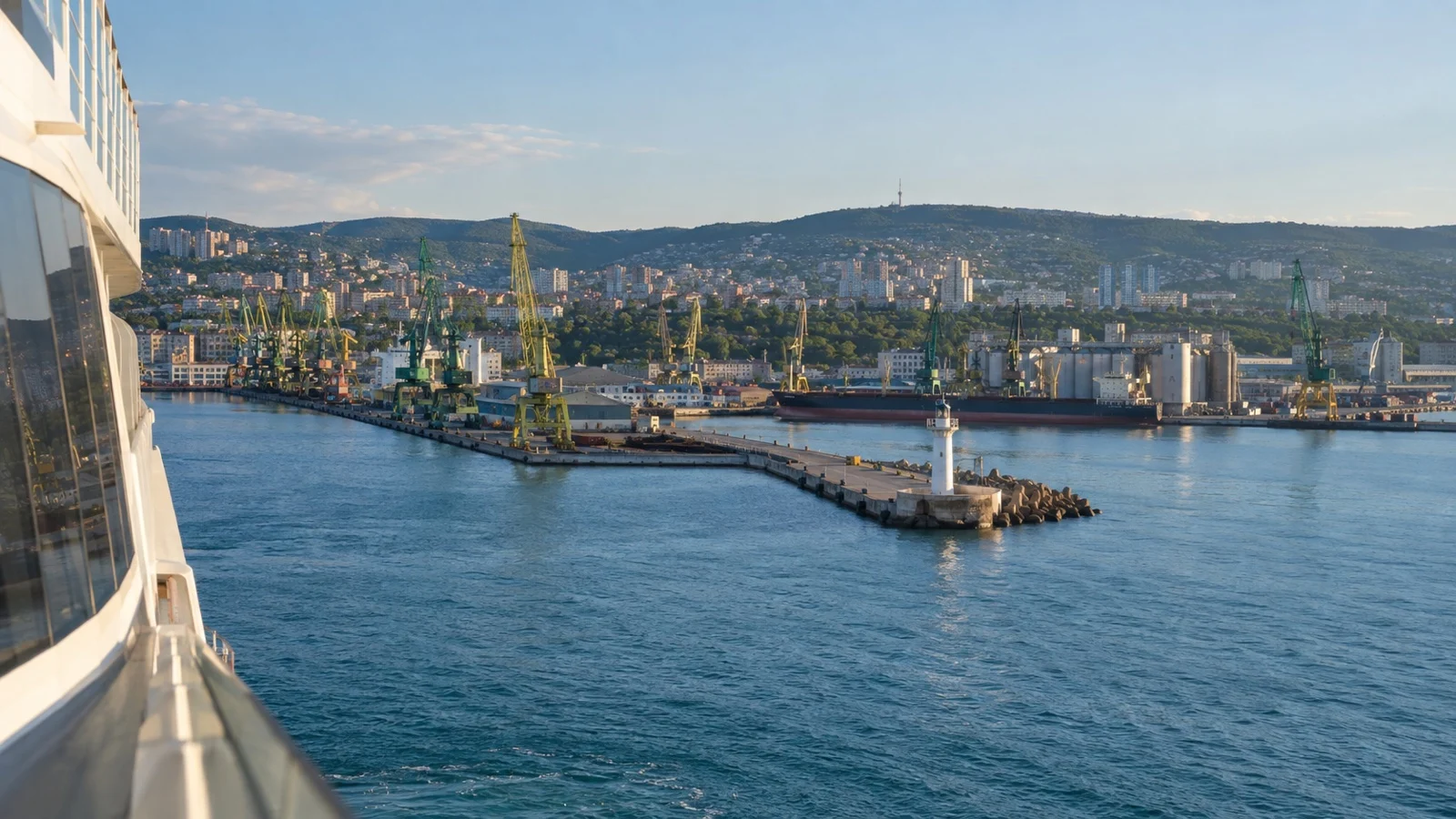 Black Sea cruise ship approaching an eastern European working port.