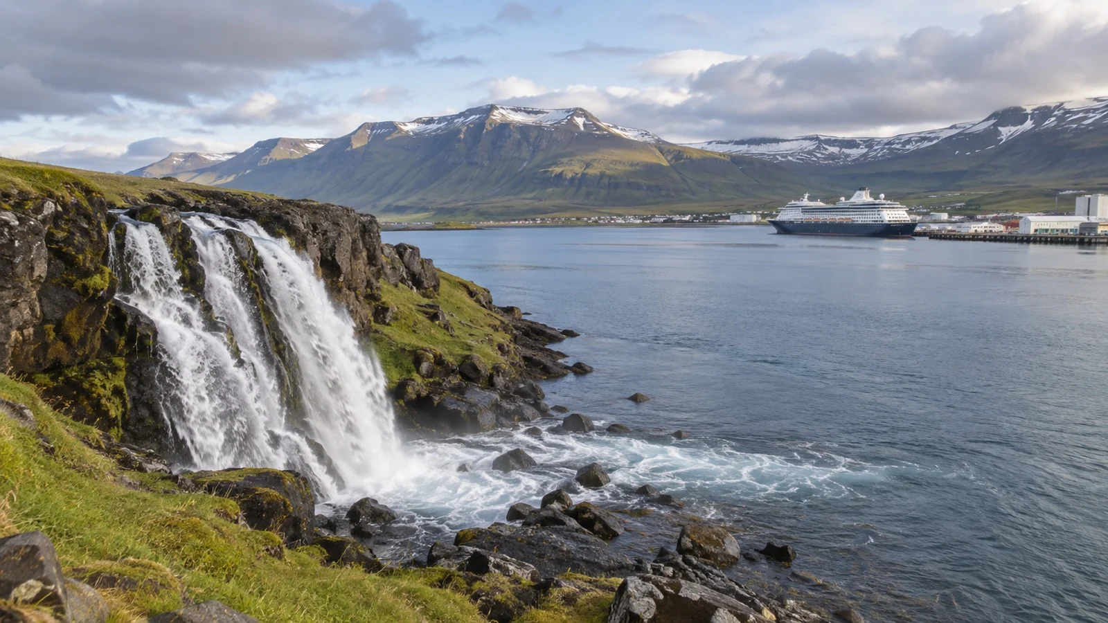 Icelandic coastal waterfall near a cruise harbor.