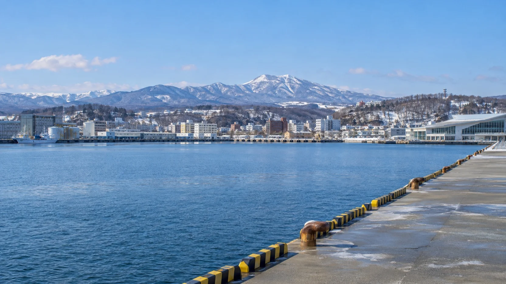 Empty quay and coastal city at Abashiri cruise port in Hokkaido