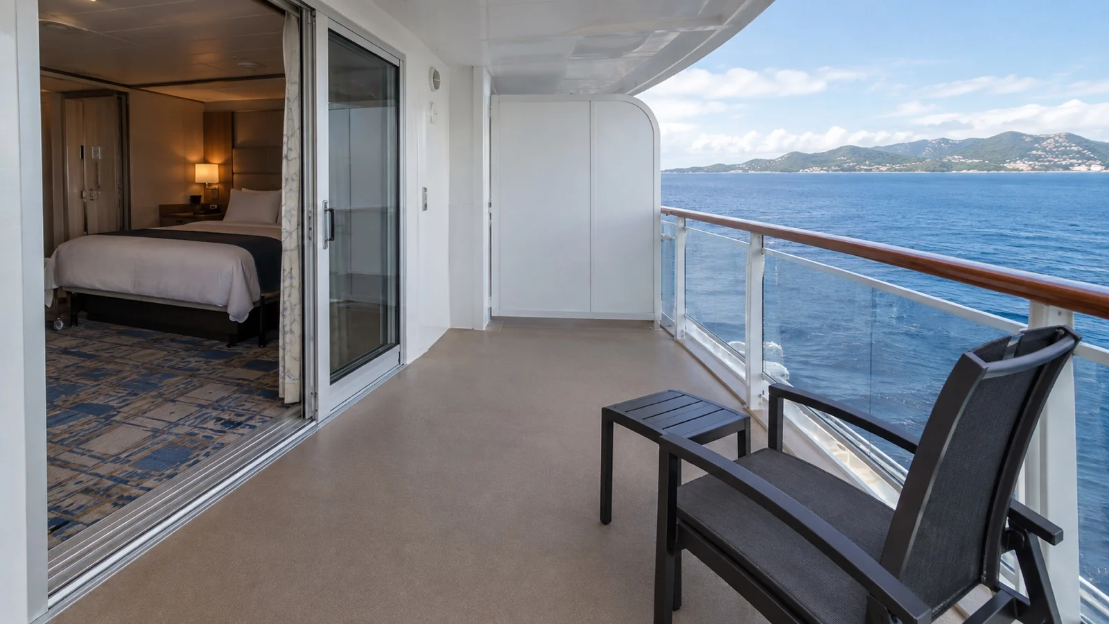 Empty accessible cruise balcony with level threshold and wide circulation space