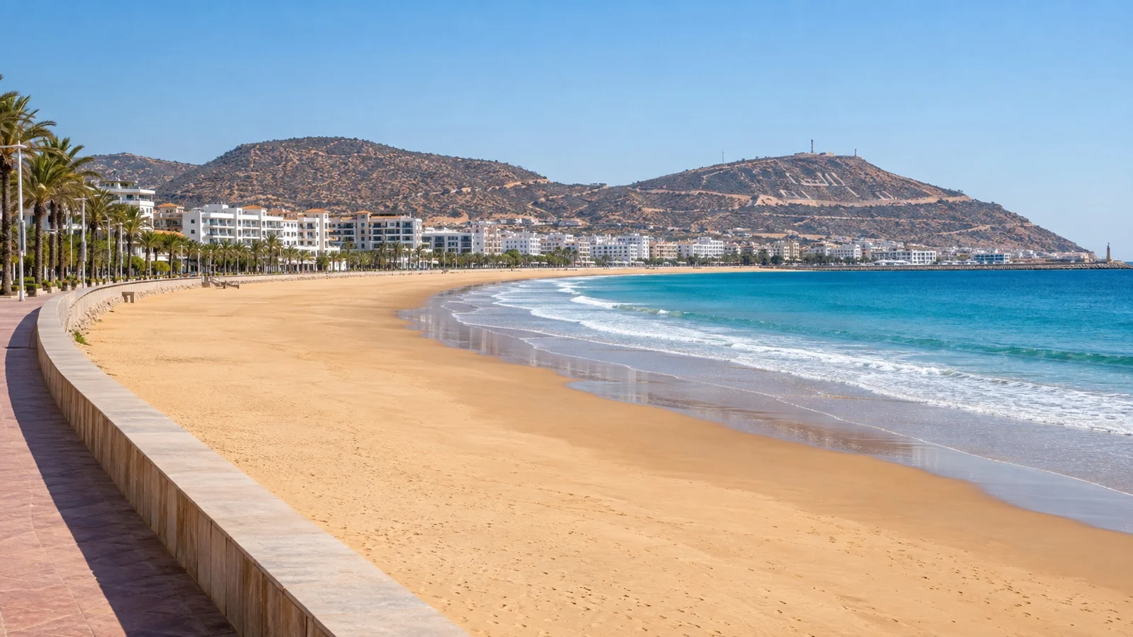 Broad sandy beach and seafront promenade at Agadir, Morocco