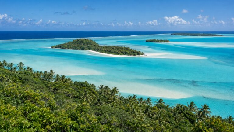 Turquoise Aitutaki lagoon and palm-covered motu islands