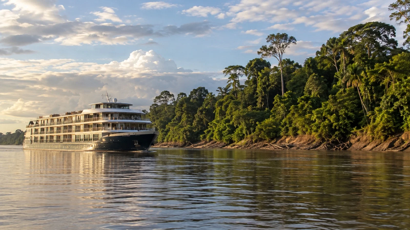 River cruise ship near Amazon rainforest shore in Brazil