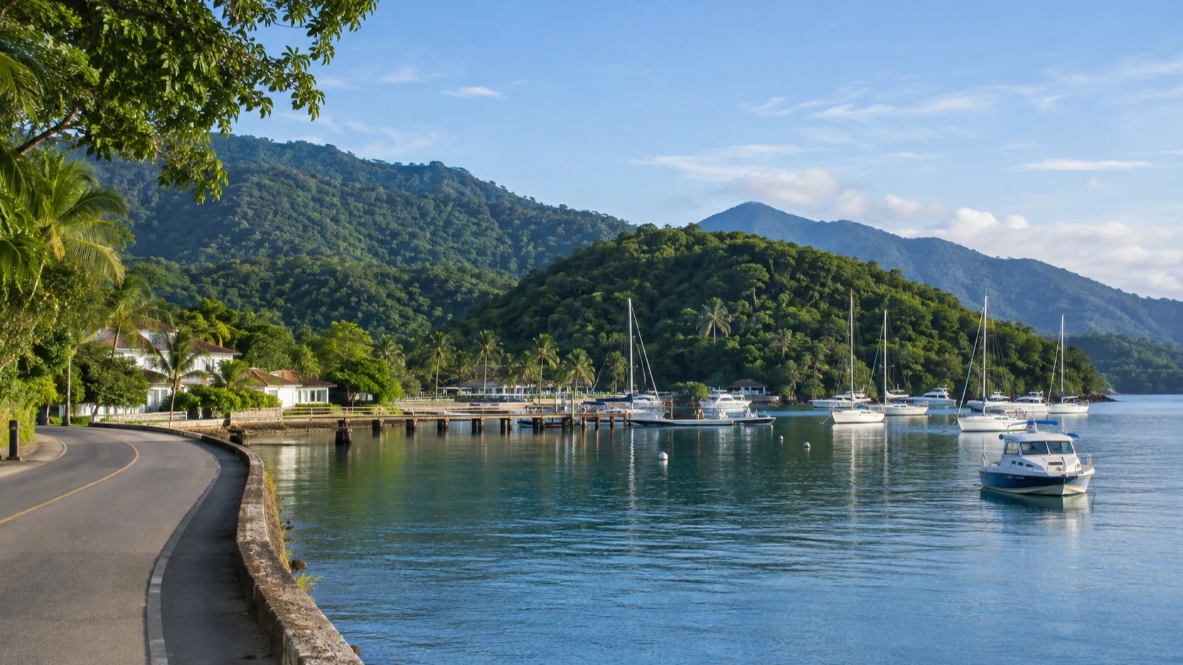 Quiet coastal road and boat marina in Angra dos Reis, Brazil