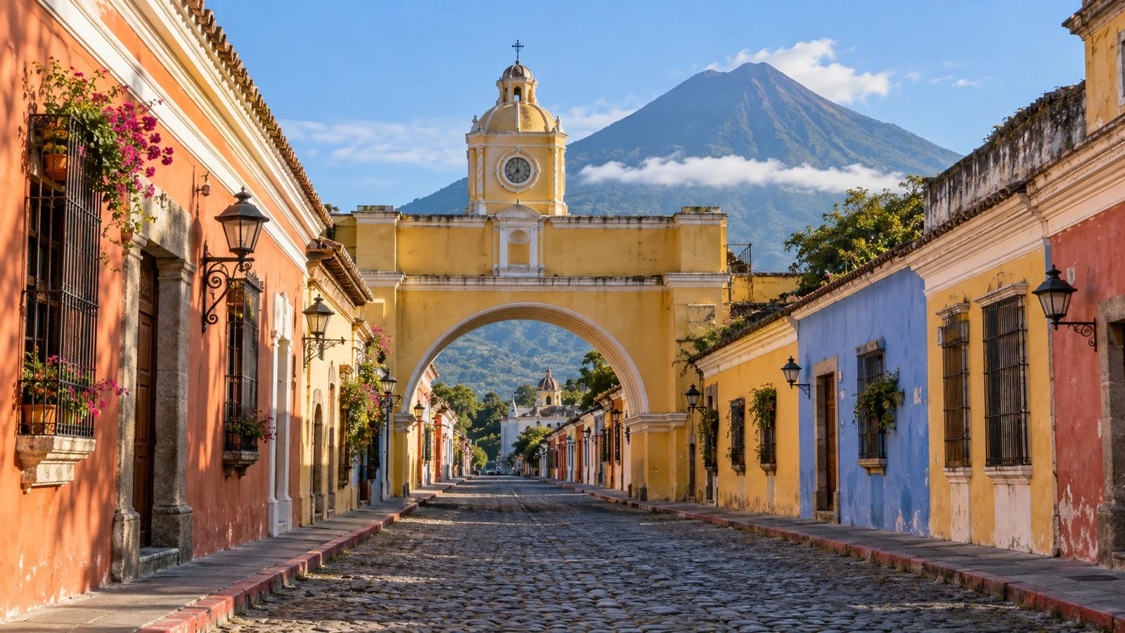 Santa Catalina Arch and Volcán de Agua above an Antigua Guatemala street