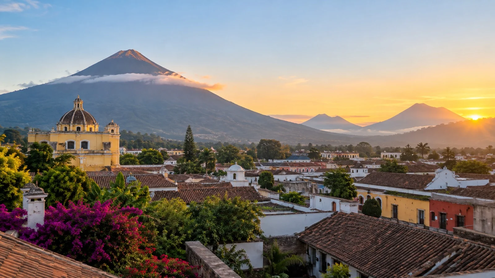 Volcán de Agua rising above Antigua Guatemala rooftops