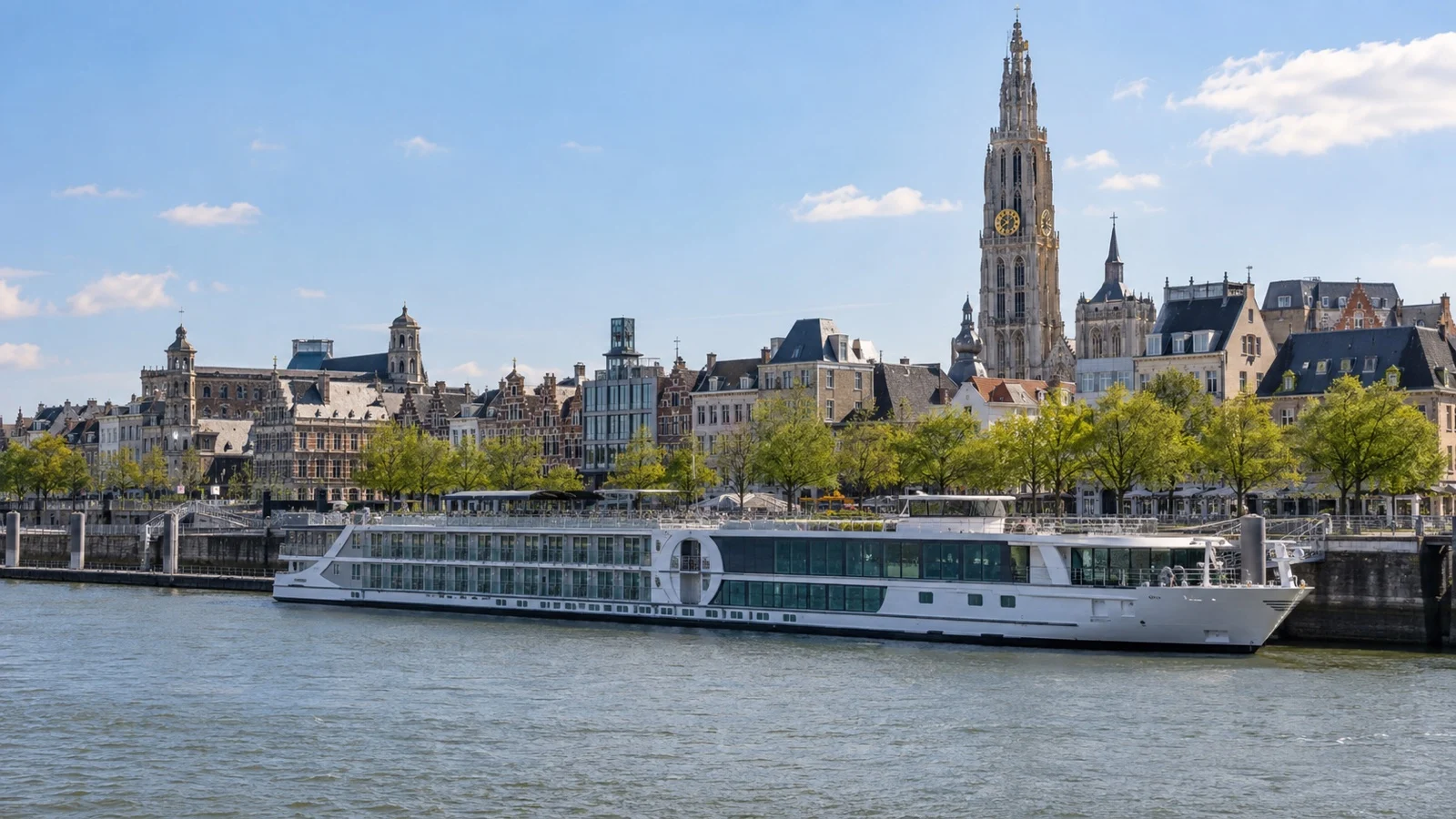 River cruise ship on Scheldt at Antwerp
