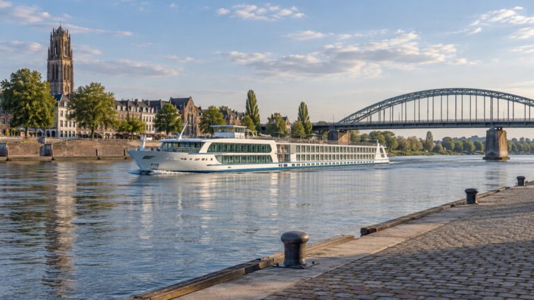 River cruise ship on the Rhine beside Arnhem's John Frost Bridge