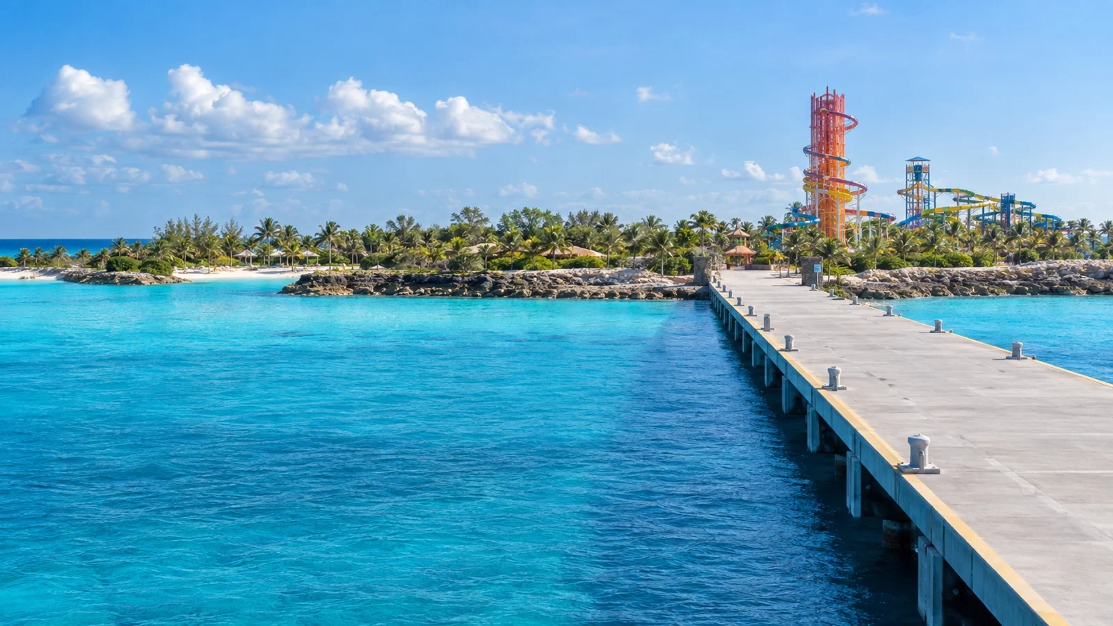 CocoCay cruise pier and colorful water park structures beside a Bahamas lagoon
