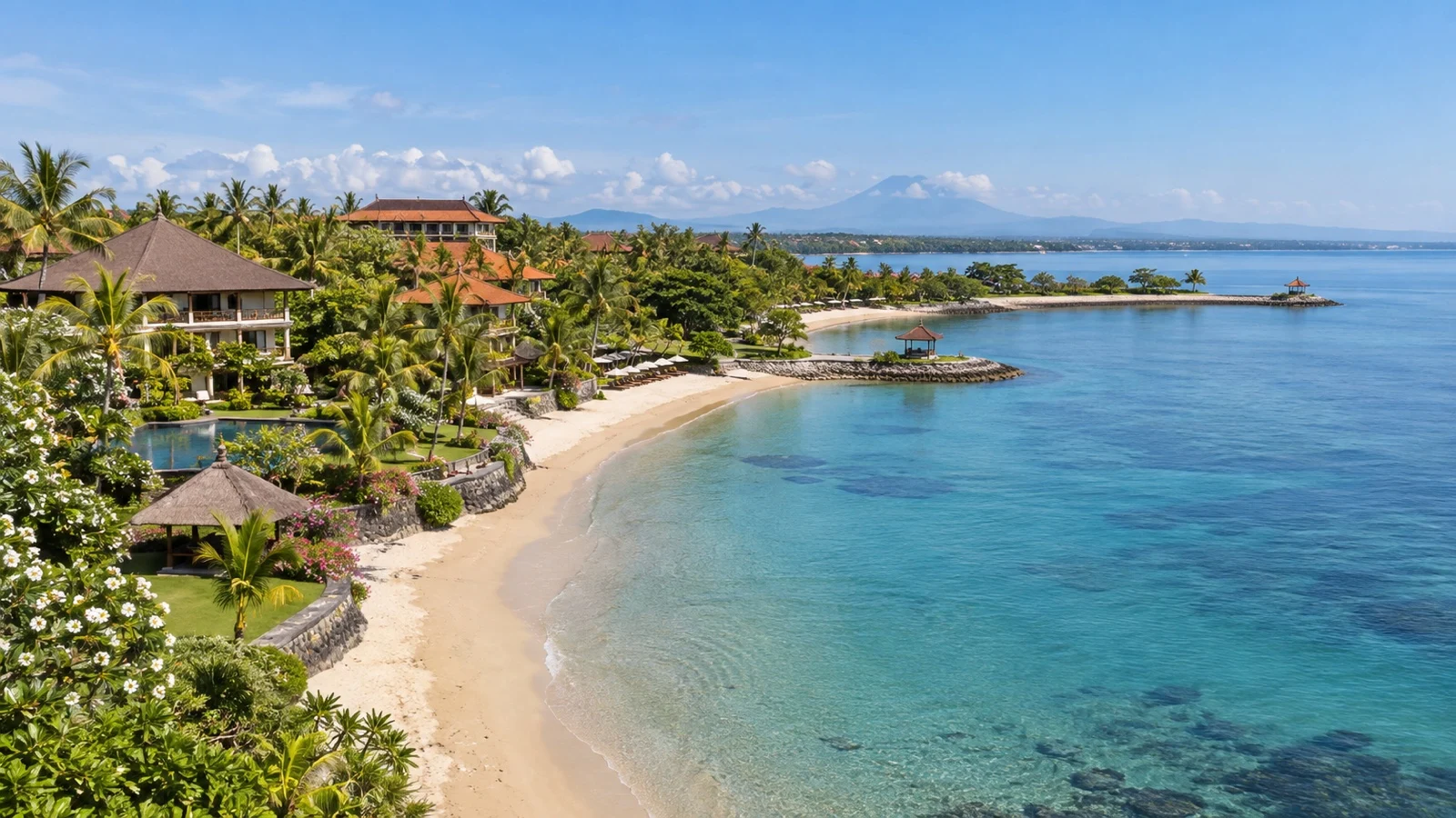 Tanjung Benoa peninsula with beachfront hotels, calm water and tropical gardens