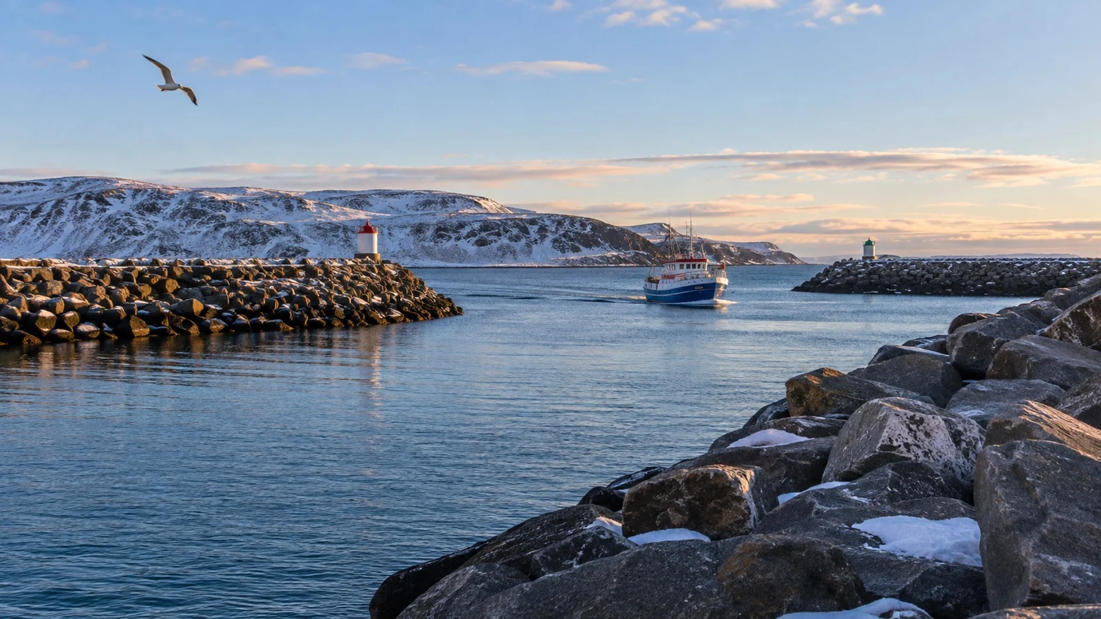 Massive breakwaters sheltering Berlevåg harbor