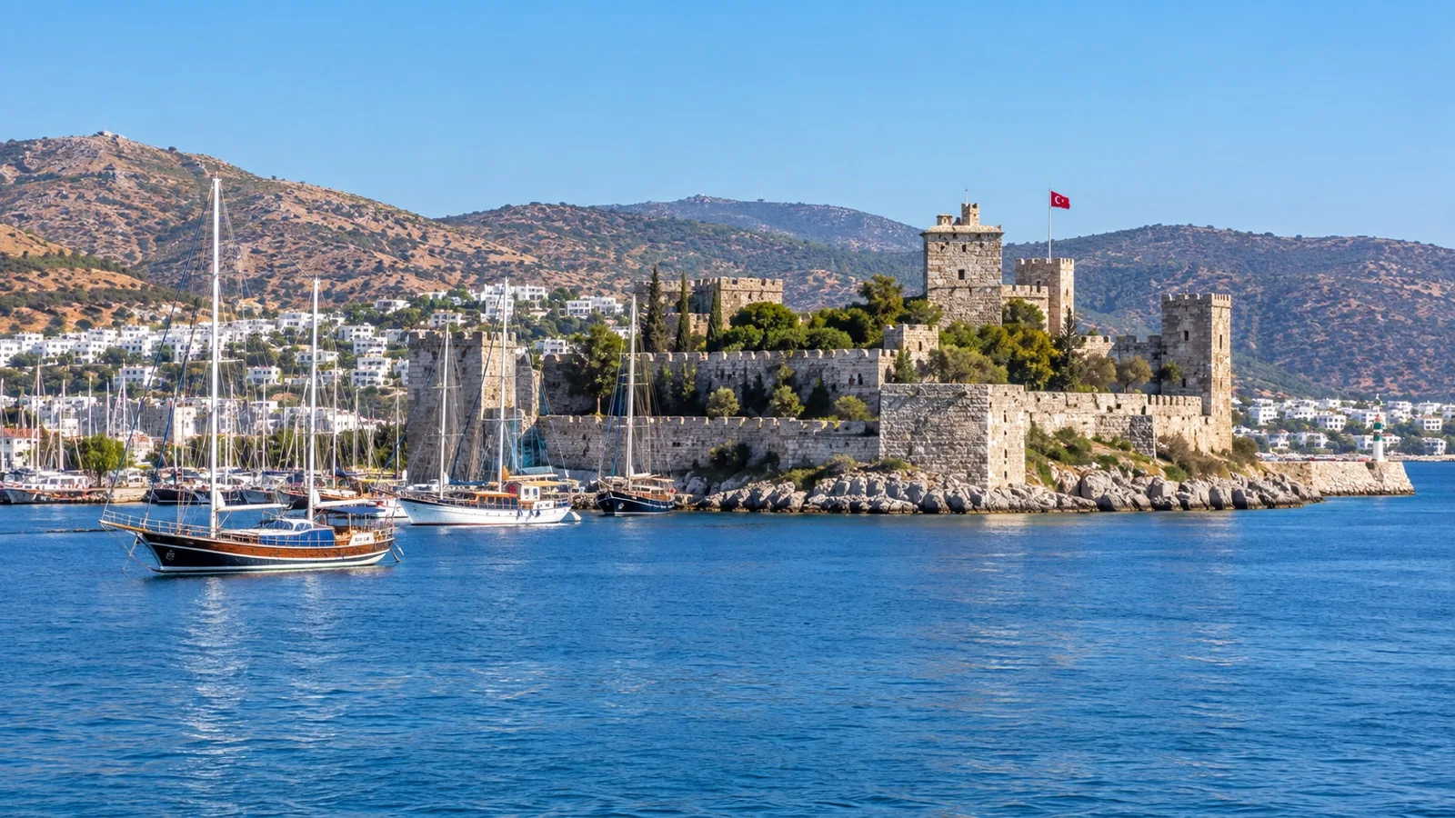 Stone towers of Bodrum Castle overlooking the harbor