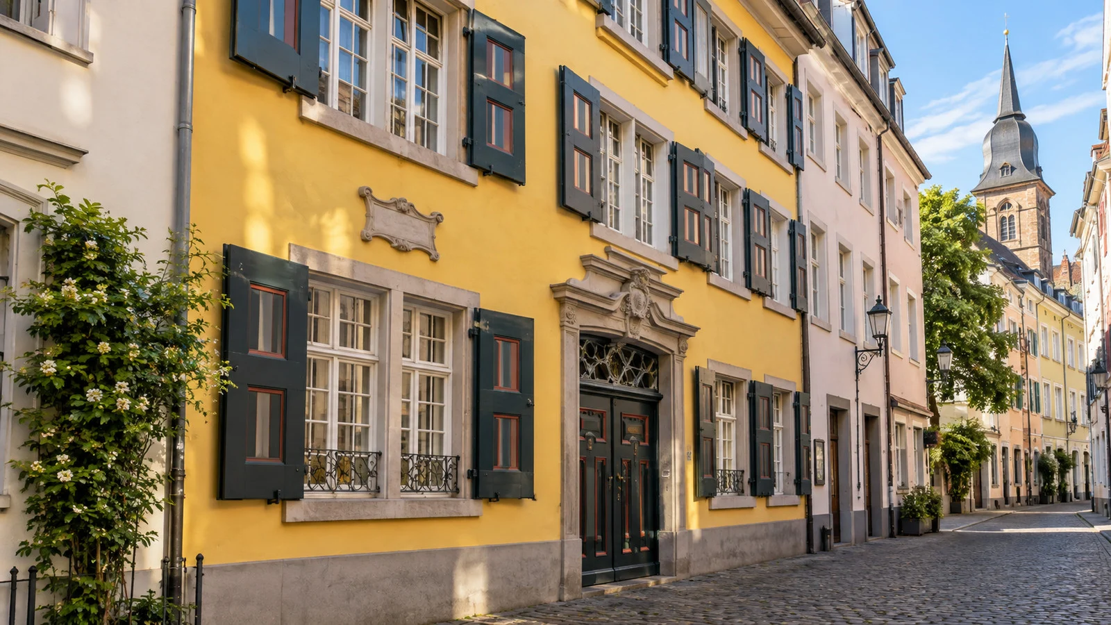 Beethoven-Haus museum exterior in Bonn on Bonngasse, an old-town yellow facade without readable signs