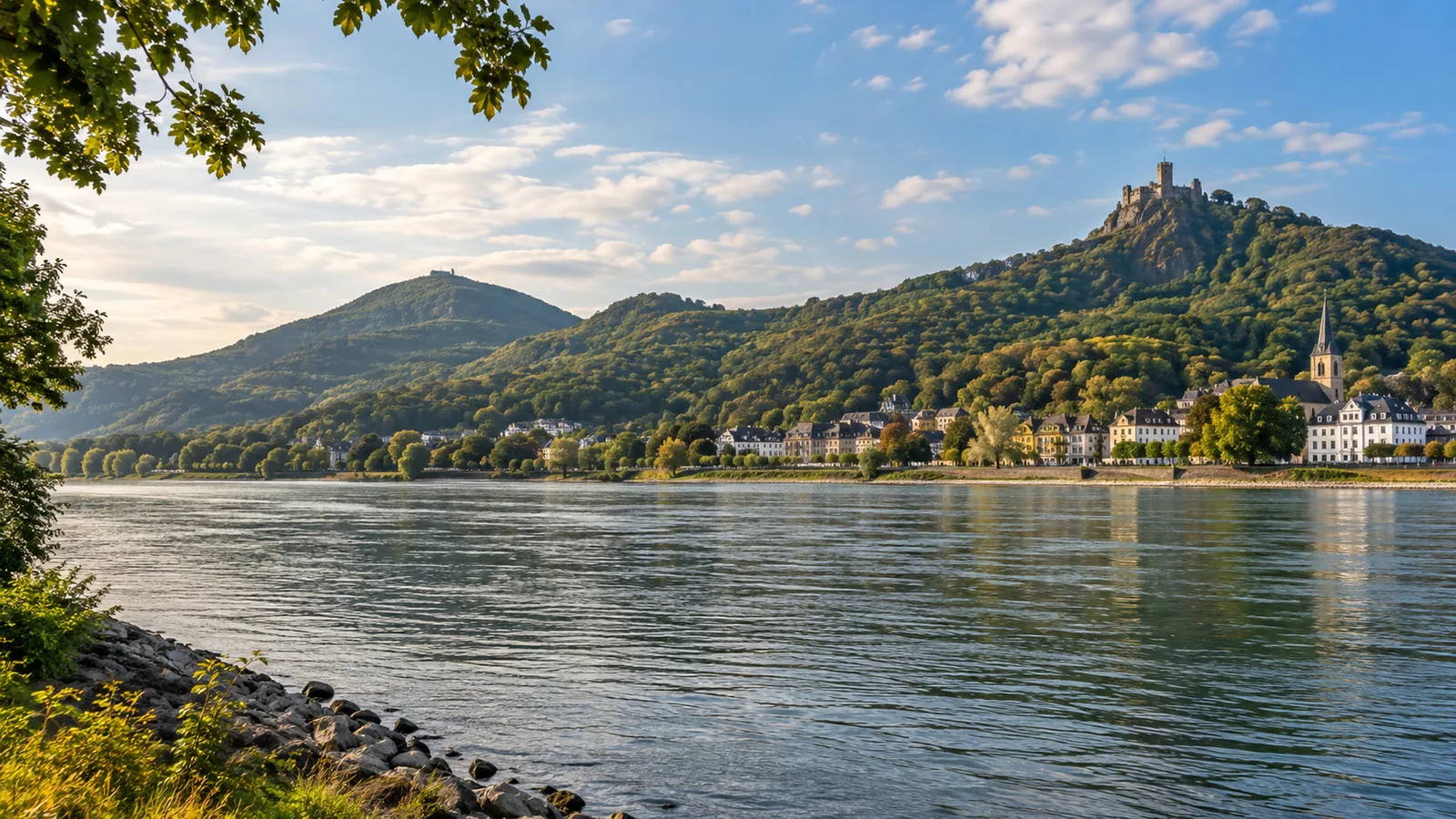 the Siebengebirge hills and Drachenfels castle seen across the Rhine near Bonn