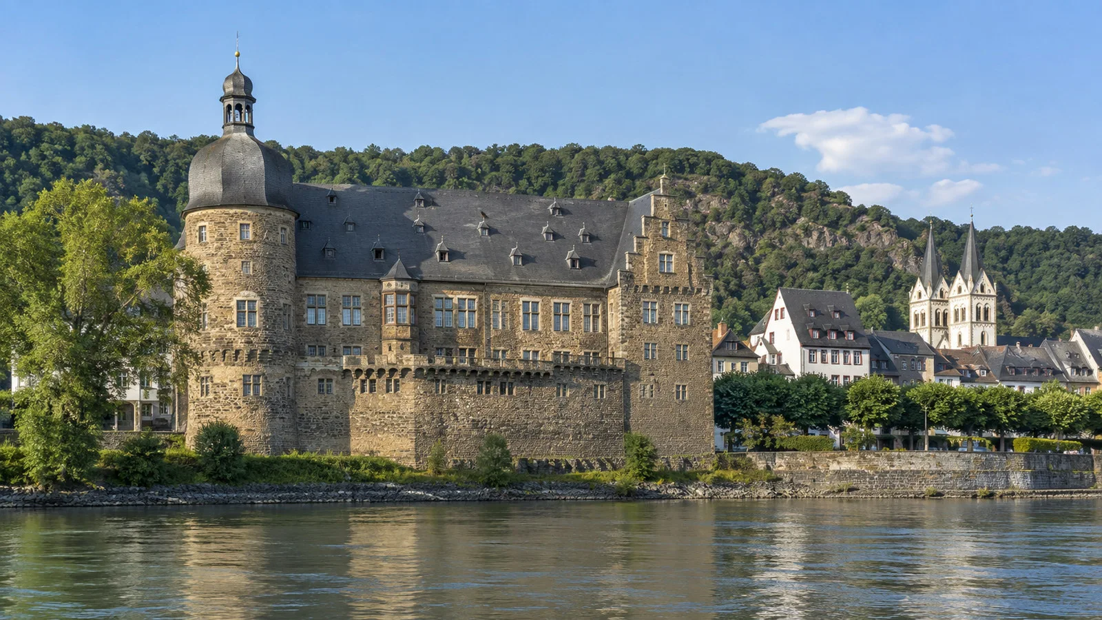 Electoral Castle of Boppard medieval stone riverside facade housing the town museum, no people