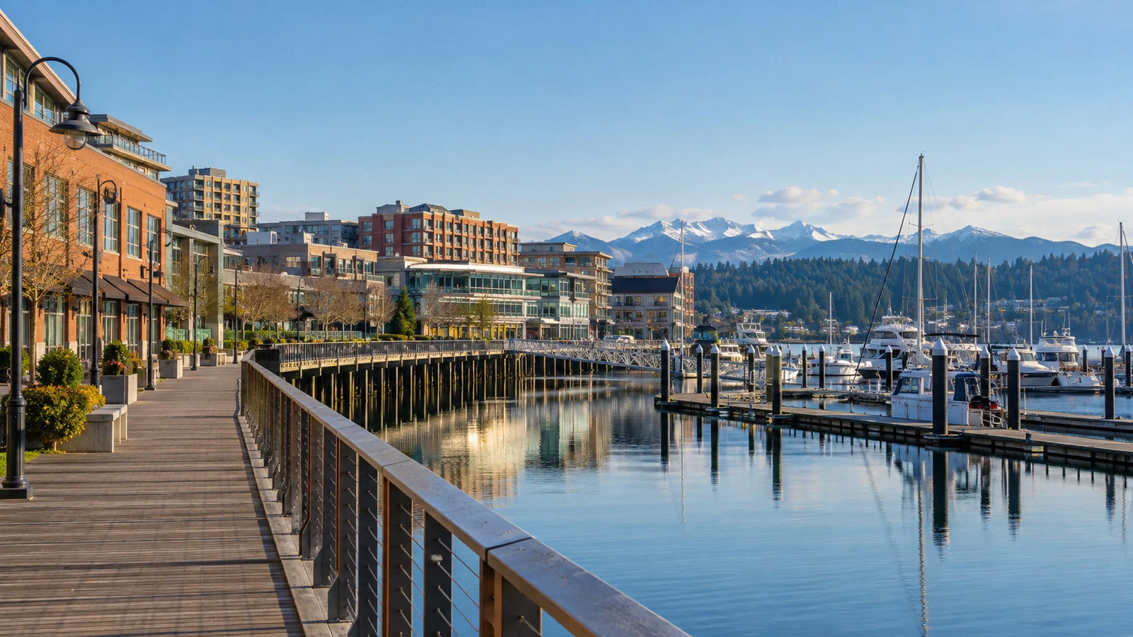 Downtown Bremerton waterfront boardwalk and marina with brick and modern buildings, no people