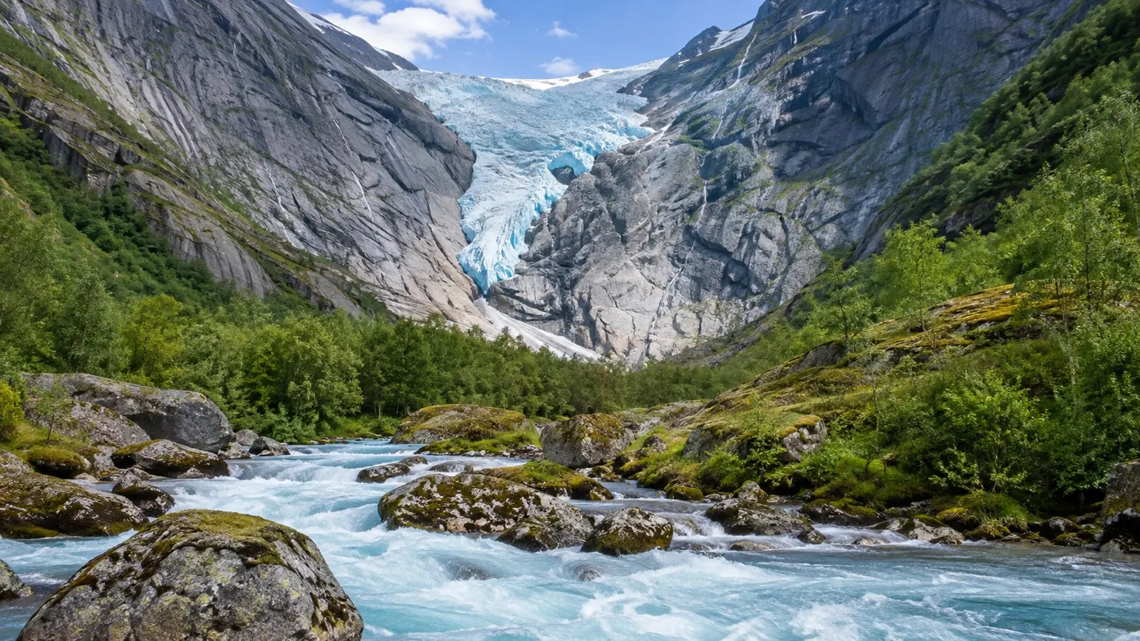 Briksdal Glacier in a green mountain valley near Olden