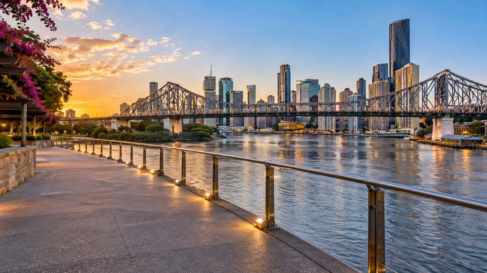 Empty Brisbane riverfront promenade with Story Bridge and skyline