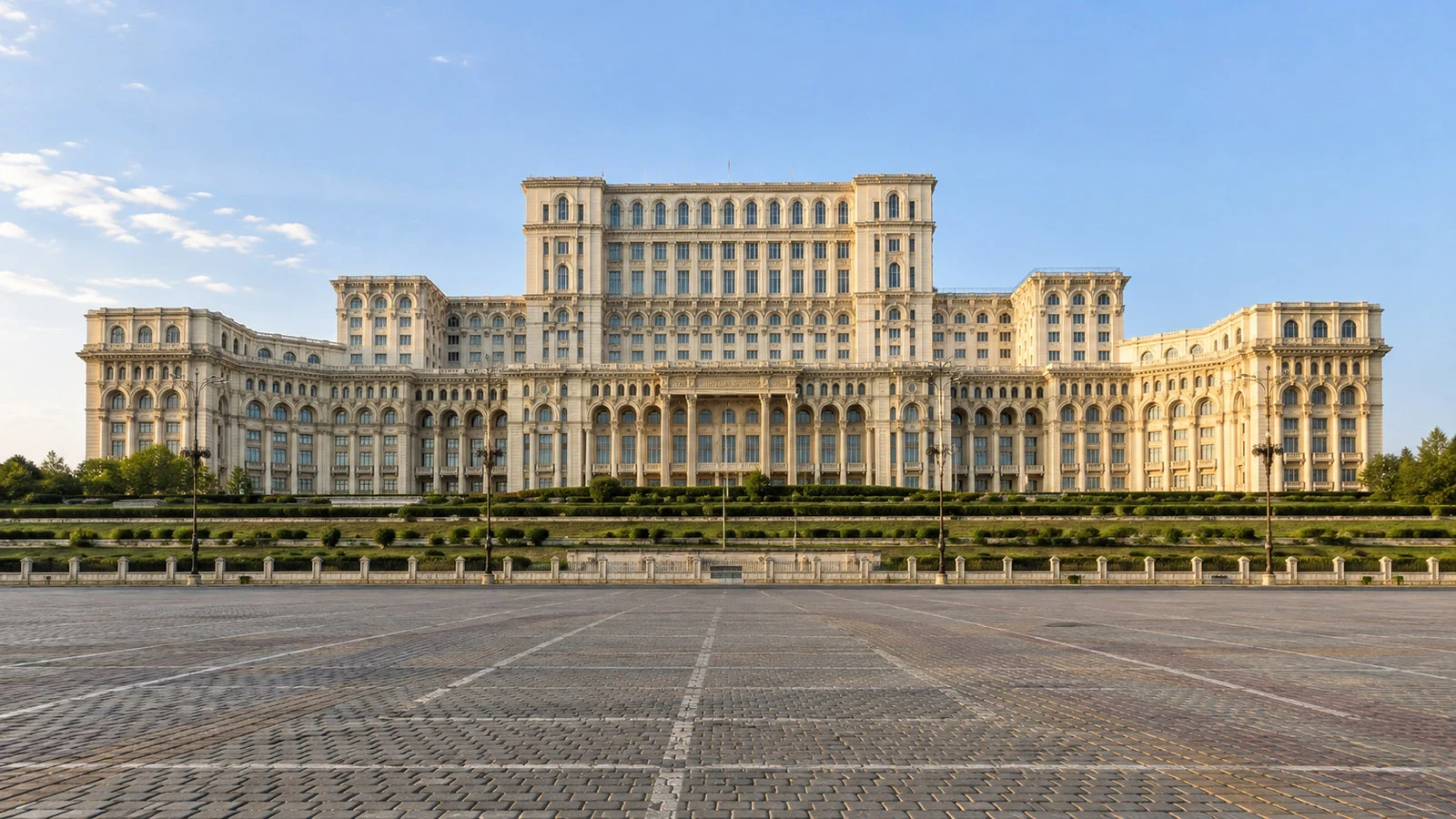 Palace of Parliament Bucharest grand long facade from empty public square, accurate neoclassical architecture