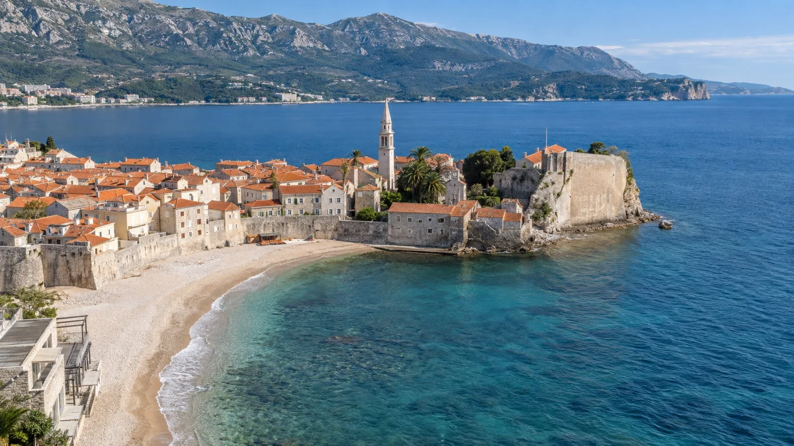 Budva old town peninsula and beach on Montenegro's Adriatic coast