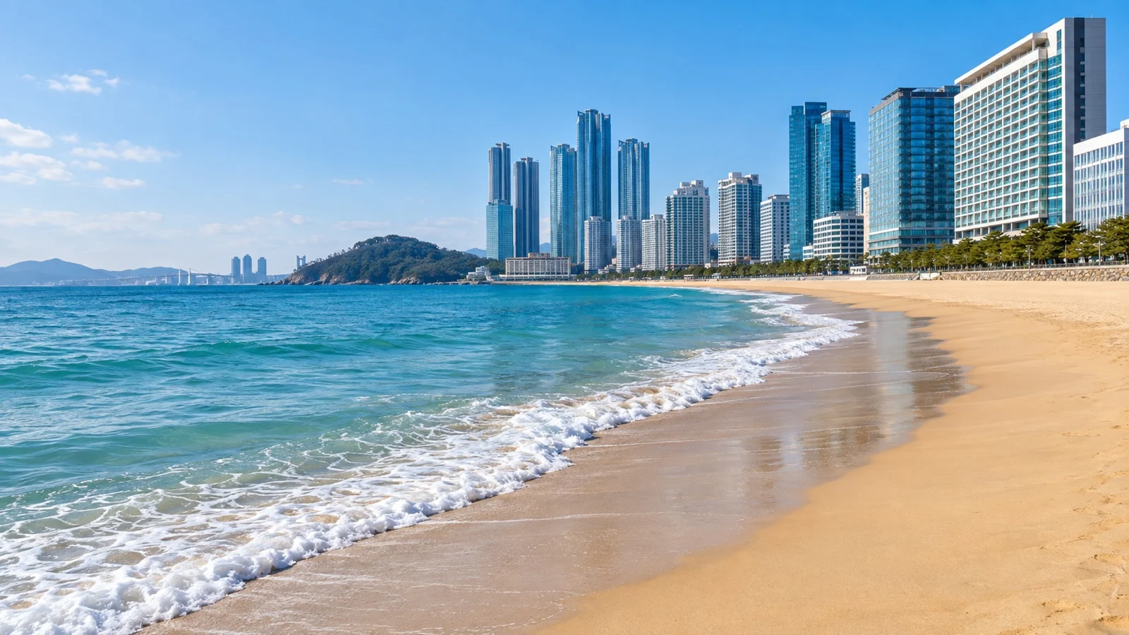 Haeundae Beach in Busan with upscale waterfront hotels, broad sand and East Sea water