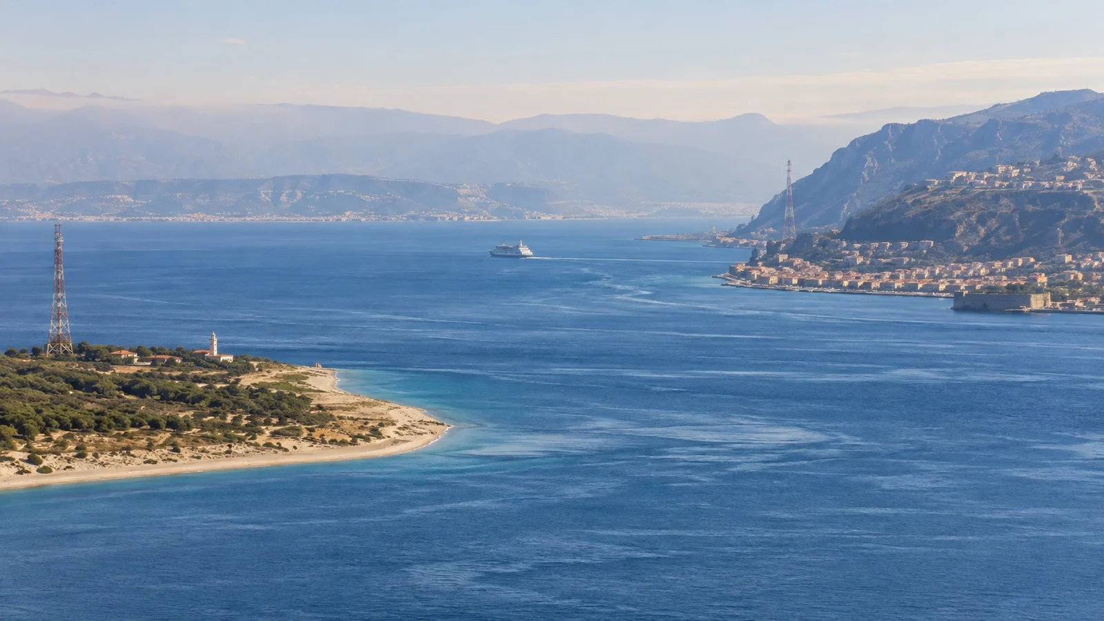 Cape Peloro and the Calabrian shore facing each other across the Strait of Messina.