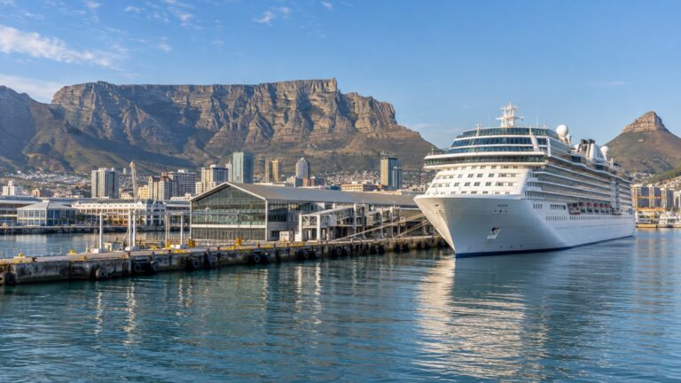 Cape Town cruise terminal at the V&A Waterfront with a white cruise ship at berth and Table Mountain in the background
