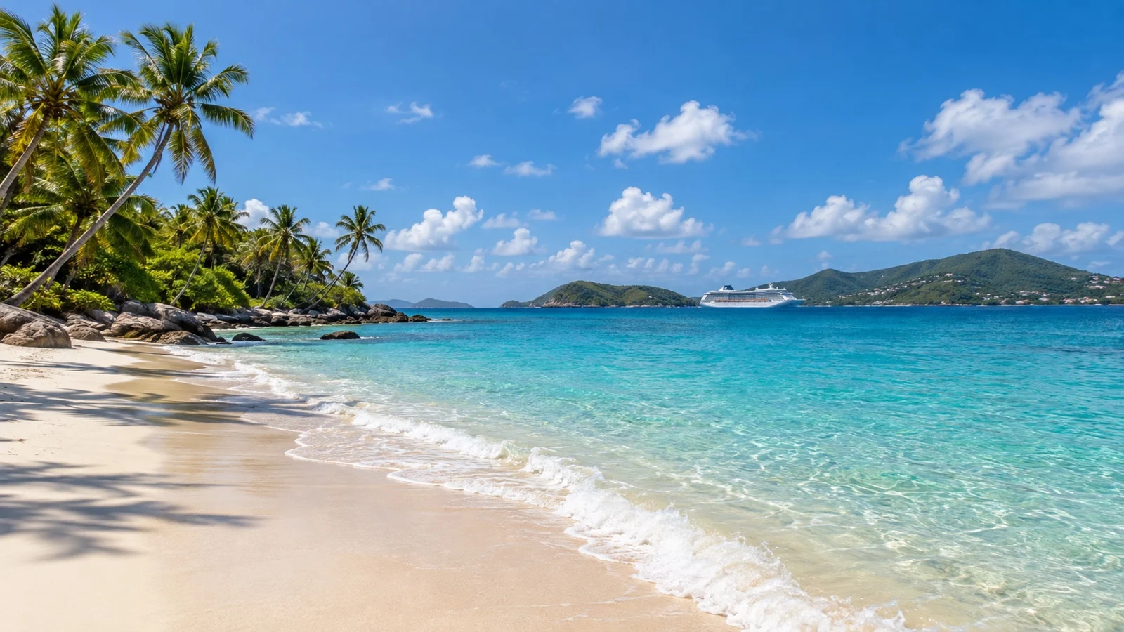 Quiet Caribbean beach with turquoise water and a cruise ship in the distance