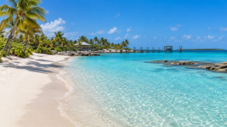 White sand and clear turquoise water at Castaway Cay