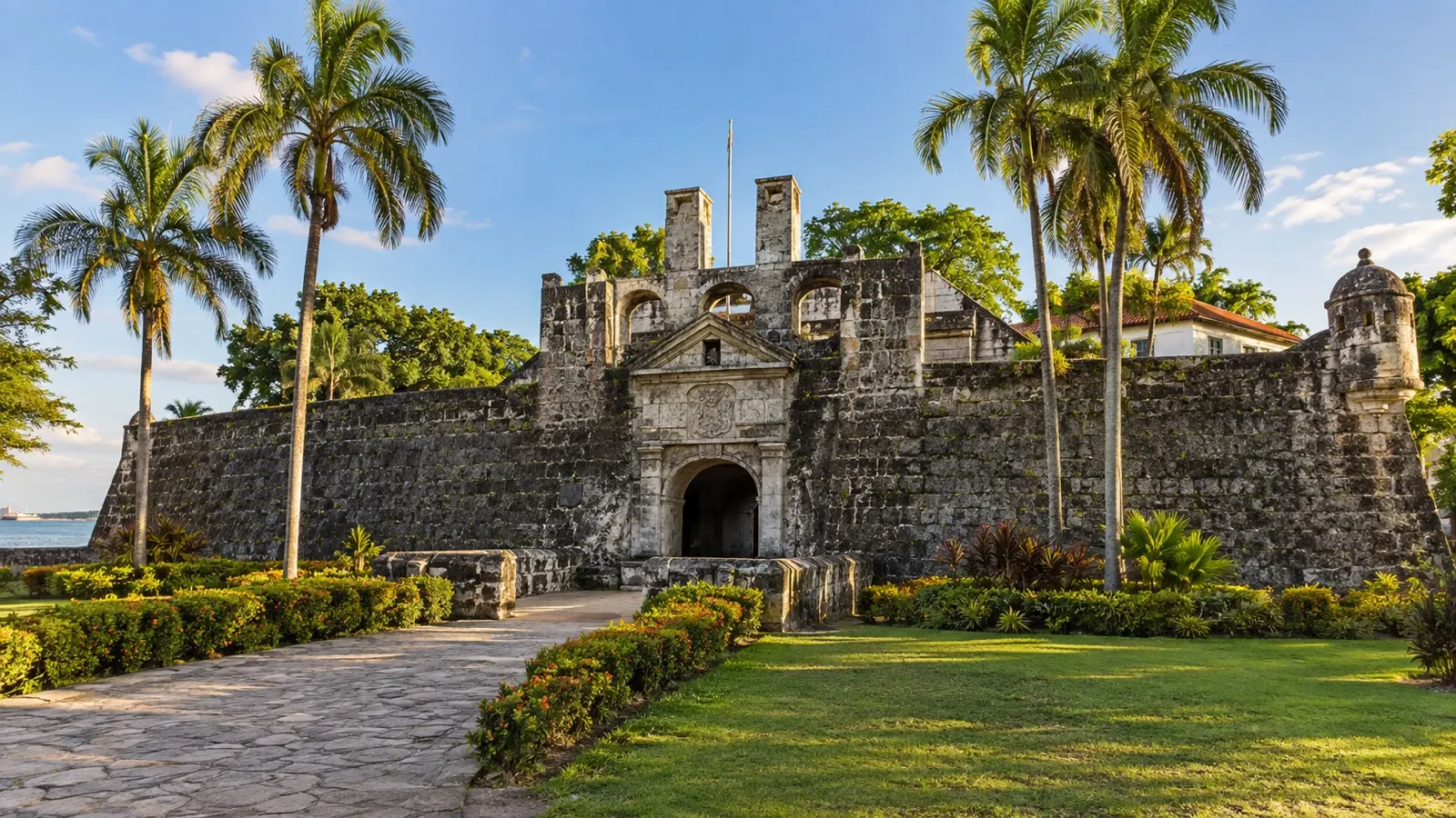 Stone walls and palms at Fort San Pedro in Cebu City