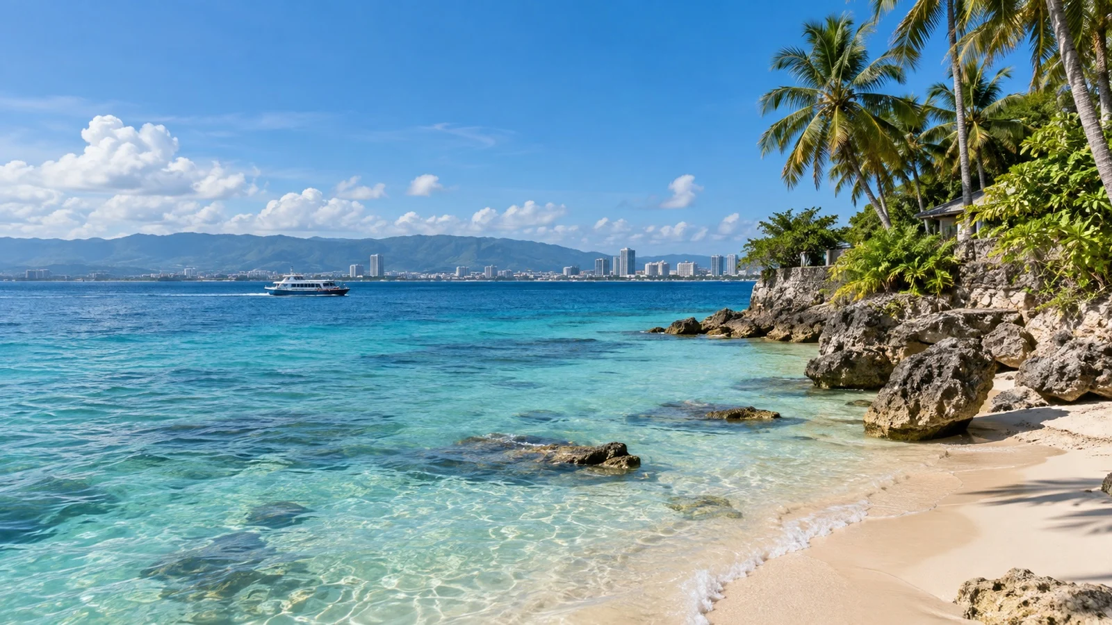 Quiet palm-lined beach and clear water on Mactan Island near Cebu