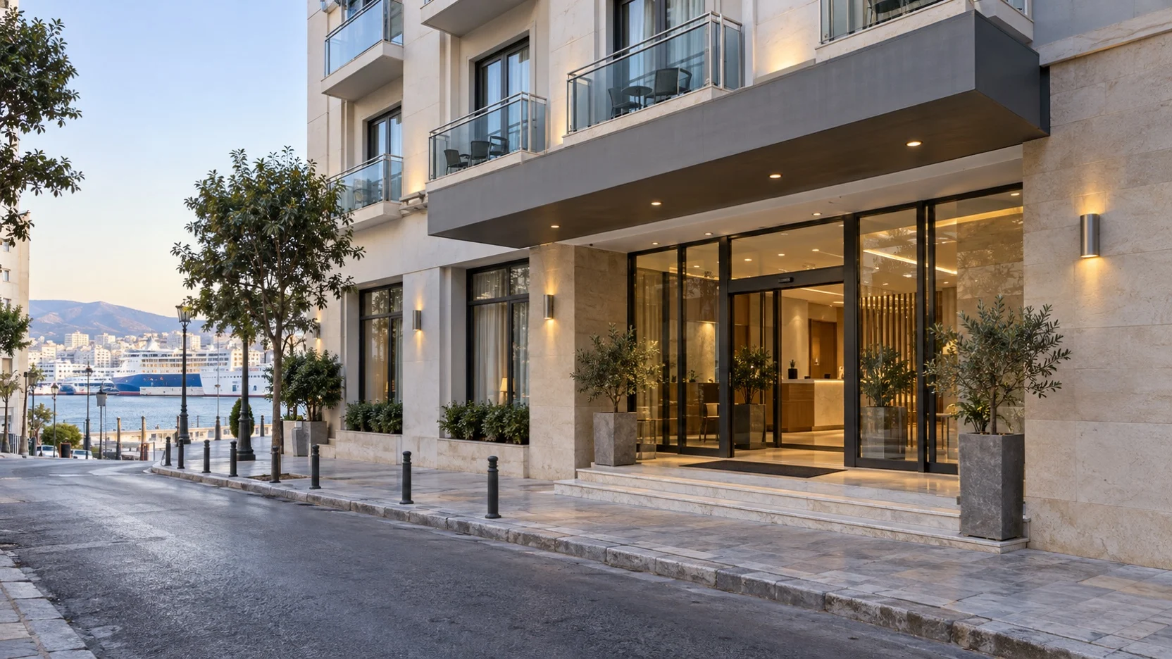 Central Piraeus hotel entrance on a quiet street near the port