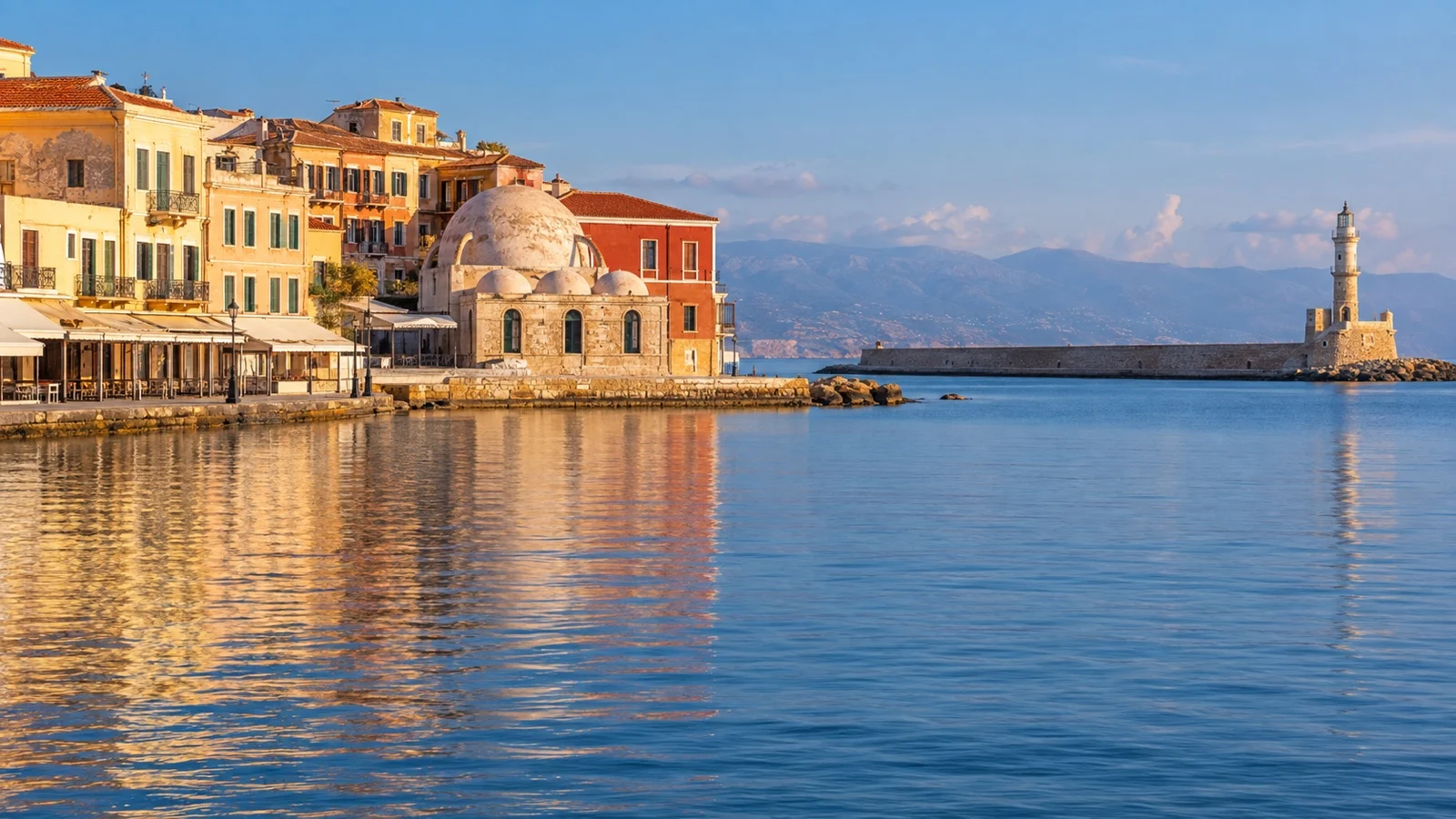 Chania Venetian Harbor waterfront with its lighthouse across the water