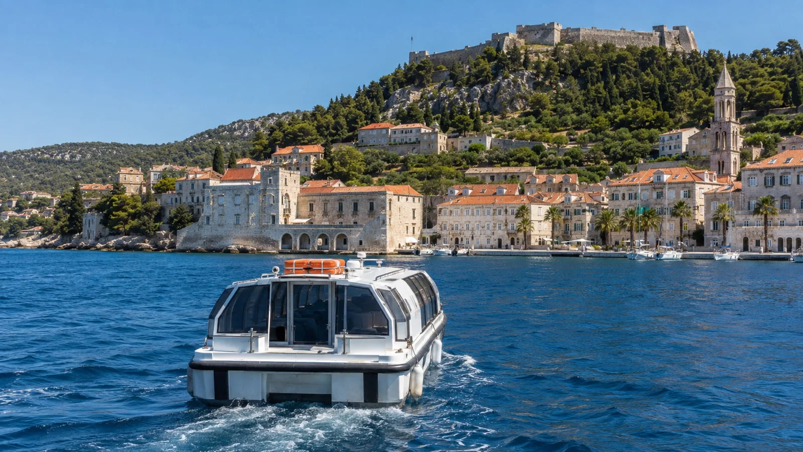 Cruise tender near Hvar island harbor