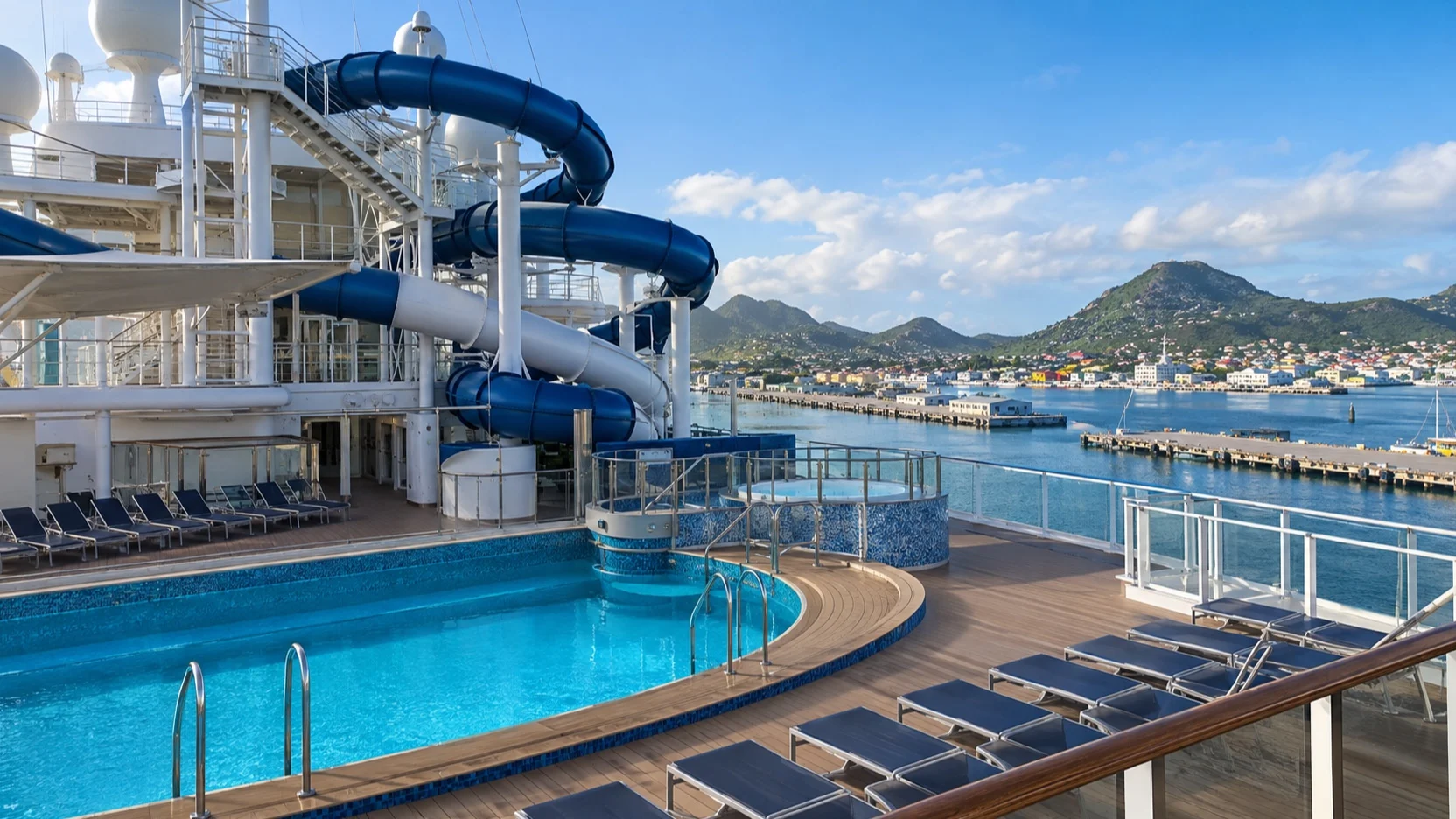 Empty cruise ship pool deck and waterslides while the ship is in port