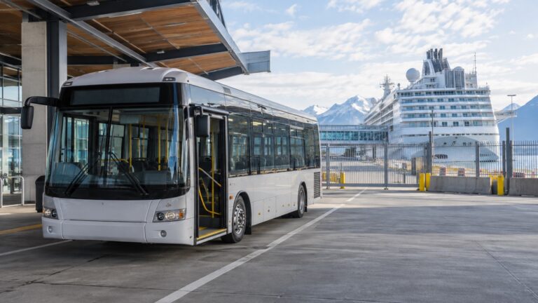 Empty port shuttle bus inside a secure industrial cruise terminal