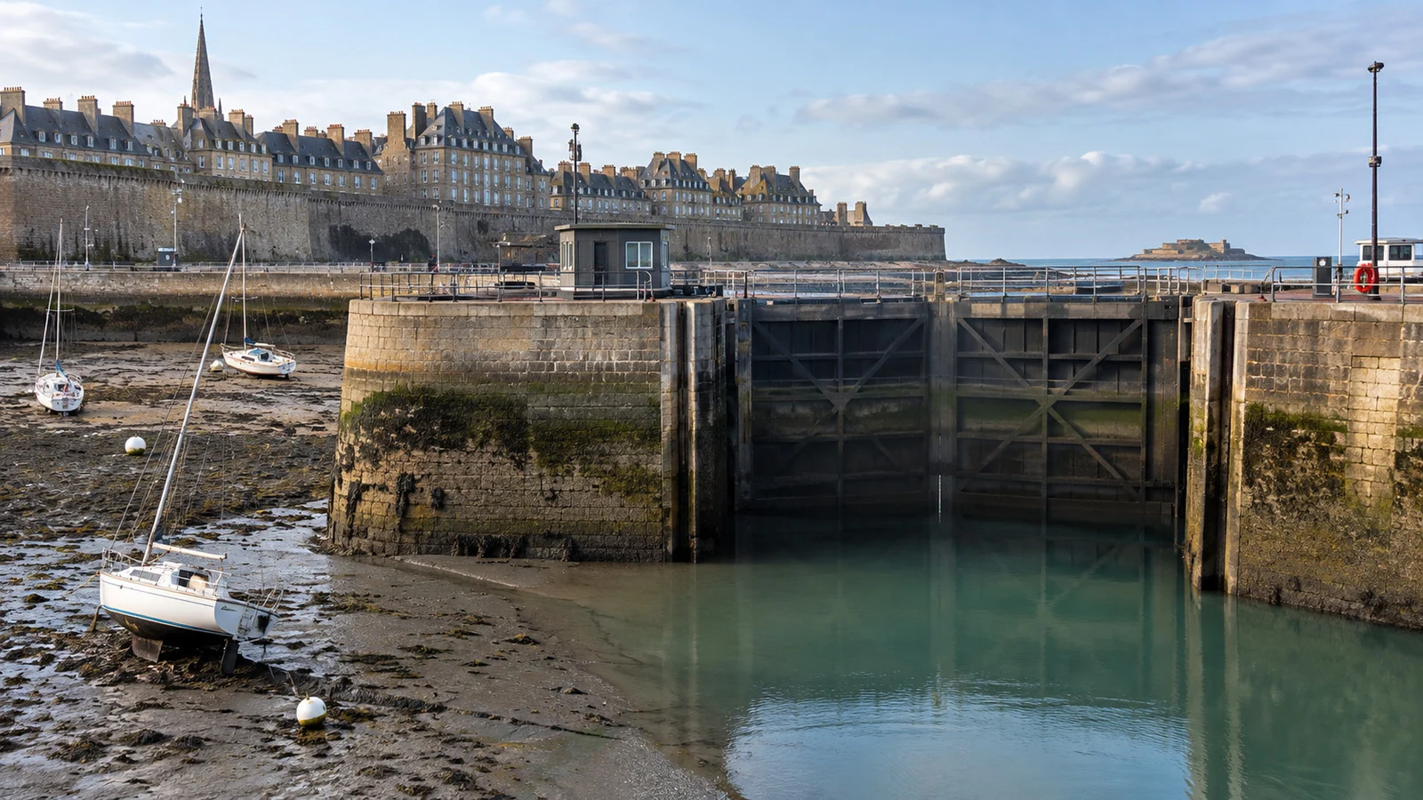 Saint-Malo harbor lock gate holding water at low tide